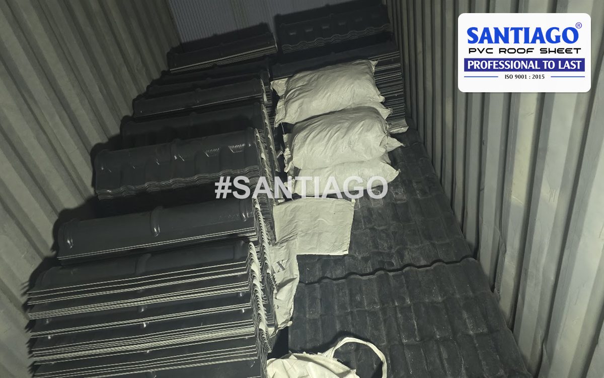 Grey ASA/PVC roof tiles stacked inside an export container, January 2026